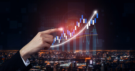 A sleek hand points at a glowing upward trend on a financial chart, representing business growth...