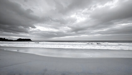 Dramatic Monochrome Coastal Landscape Of Stormy Sky Over Ocean And Sandy Beach