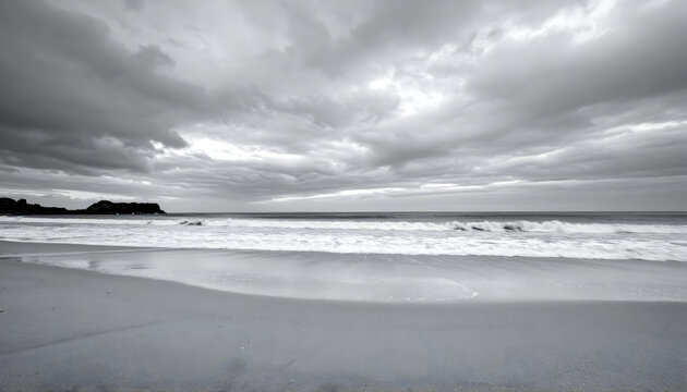 Dramatic Monochrome Coastal Landscape Of Stormy Sky Over Ocean And Sandy Beach