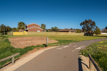 vibrant photos of Playford's landscape transformation. Showcase grant-funded revegetation, mass plantings, and biodiversity at Craigmore Park. Capture spring meadows, young forests
