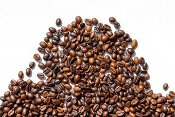 Heap roasted coffee beans. Top view on white background. Space for text.