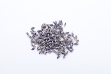 Pile of dried lavender flowers on white background, top view