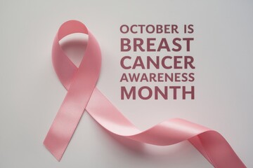 October is breast cancer awareness month with pink ribbon on white