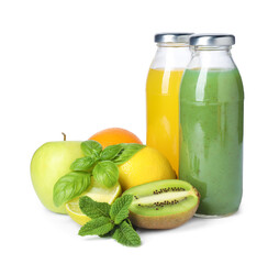 Tasty juices in glass bottles, fresh fruits, mint and basil isolated on white