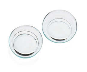 Pair of contact lenses isolated on white, top view