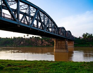 Fototapeta premium Steel arch bridge over river