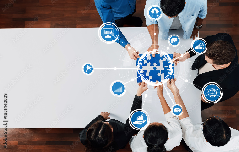 Poster a diverse group of professionals collaborates around a table, utilizing puzzle graphics and analytic