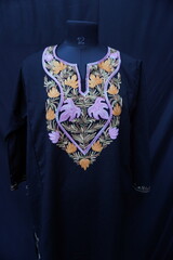 Kashmiri pheran displayed on a mannequin in Kashmir