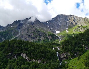Mountainous landscape with waterfalls