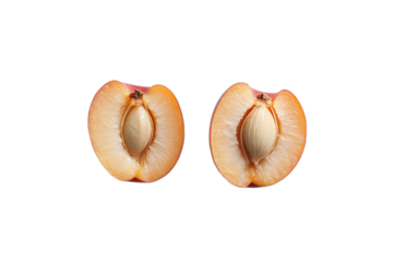 Two halved plums with pits showing close up on transparent background