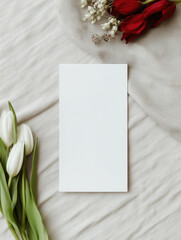 Elegant boho invitation card mockup with fresh flowers on textured fabric background