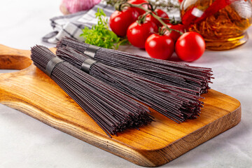 Raw black rice noodles lines
