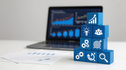 Strategic Business Growth Pyramid with Data Analytics on Laptop Display for Corporate Success and Innovation