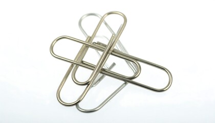 Two metal paperclips arranged in a complex overlapping formation.