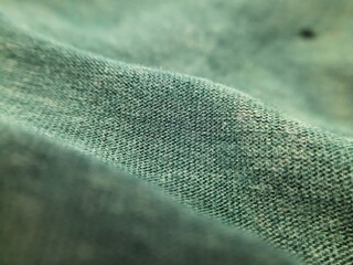 closeup old green bamboo cotton clothes texture