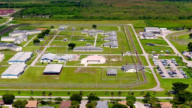 Aerial footage Homestead Miami detention facility. Drone video jail compound