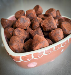 Cocoa-Dusted Chocolate Truffles in Heart-Shaped Bowl