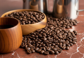 Roasted coffee beans spread across a surface, highlighting rich brown tones, texture, and aroma in a detailed macro shot.