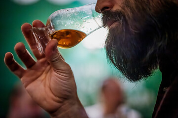 Person holding a whisky glass