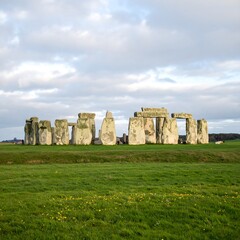 Naklejka premium Ancient stone circle in a grassy field (1)