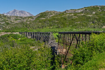 Historic White pass and yukon Railroad suspension bridge deteriorating seen in Skagway Alaska