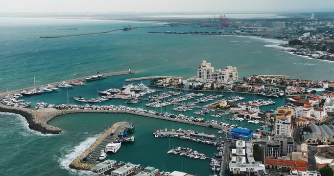 Aerial view of the cityscape of Limassol, Cyprus. Marina parking for yachts and boats in a city on an island in the Mediterranean Sea.