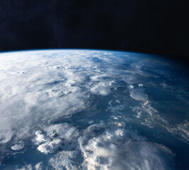 Amazing planet Earth with world ocean and clouds in outer space on a starry sky. Blue Earth in the...