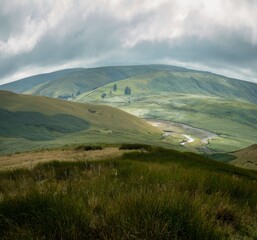 Fototapeta premium Rolling Green Hills and River