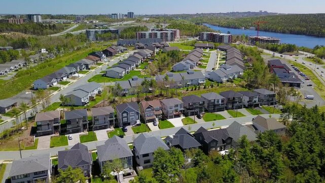 Aerial view of a modern residential neighborhood with houses and trees in halifax