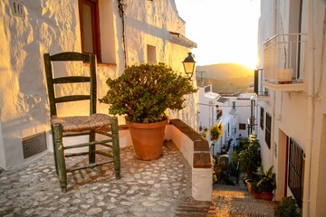 Charming Andalusian street at sunset.