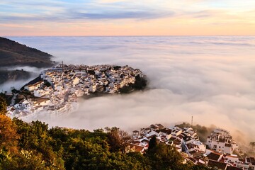 Spanish Village in Clouds at Sunset
