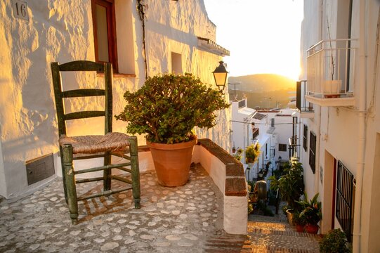 Charming Andalusian street at sunset.