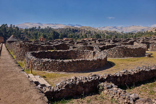 Inca settlement of Raqchi, home to the Temple of Wiracocha and hundreds of circular stone structures that once served as dwellings and storage. Nestled in the Cusco region.