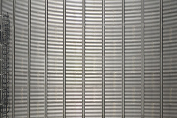 Metal grain silo close-up © Meg Brill