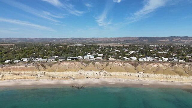 Port Willunga Beach, South Australia &ndash; 4K Aerial Drone Footage of Australia Beach, Historic Jetty Ruins, Limestone Cliffs, Golden Sand, Clear Blue Ocean Coastline, and Coastal Houses