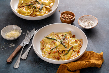 Pumpkin ravioli with brown butter pecan sauce and sage