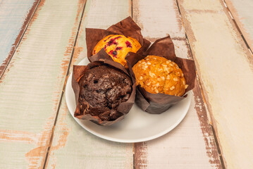 Freshly baked muffins with praline topping and Toasted hazelnuts for a textural contrast