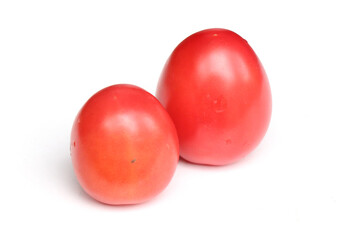 Ripe red tomatoes on white background