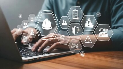 Person typing on laptop with work safety icons and caution signs overlayed on the screen display seen - Powered by Adobe