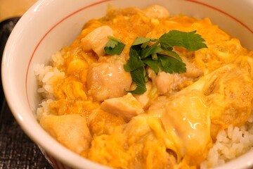 Oyakodon
= A Japanese dish consisting of fried chicken bits and eggs served in a bowl with rice and assorted seasoning