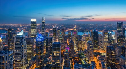 Obraz premium Shanghai Skyline at Night: Illuminated Skyscrapers and Urban Panorama