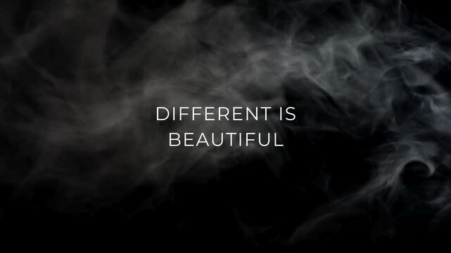 Motivational quote 'Different Is Beautiful' with abstract smoke and dark background texture