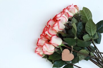 Rose Jumilia, bouquet of roses, pink rose flowers on the table, free space, top view