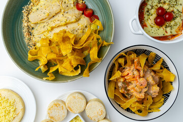 Top view flat lay of a delicious Colombian food feast, a variety of traditional and gourmet dishes...