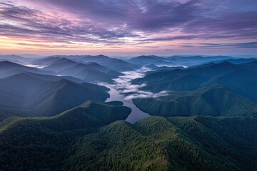 Misty mountain valley at dawn