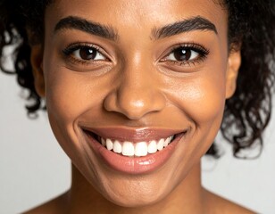 Happy womans smiling face closeup.