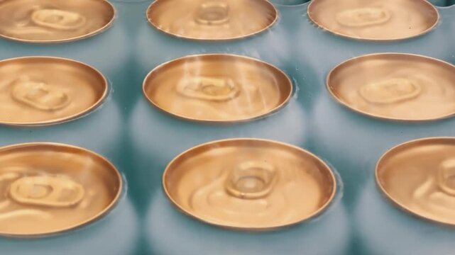 Aluminum Beverage Cans Shrink Wrapped in Multipacks at Wholesale Distribution Warehouse Close Up