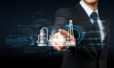 Businessman in Suit Pointing at Digital Interface with Industrial Elements and Data Visualization for Technology and Engineering Concepts