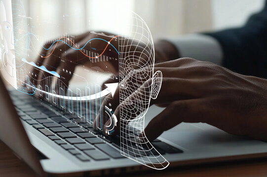 Human hands working on laptop with digital graphics of artificial intelligence and data analysis overlay for modern technology and innovation concept