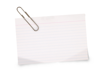 Real notepad with grid line isolated. White grid notepaper journal sticker. A blank sheet of checkered paper.